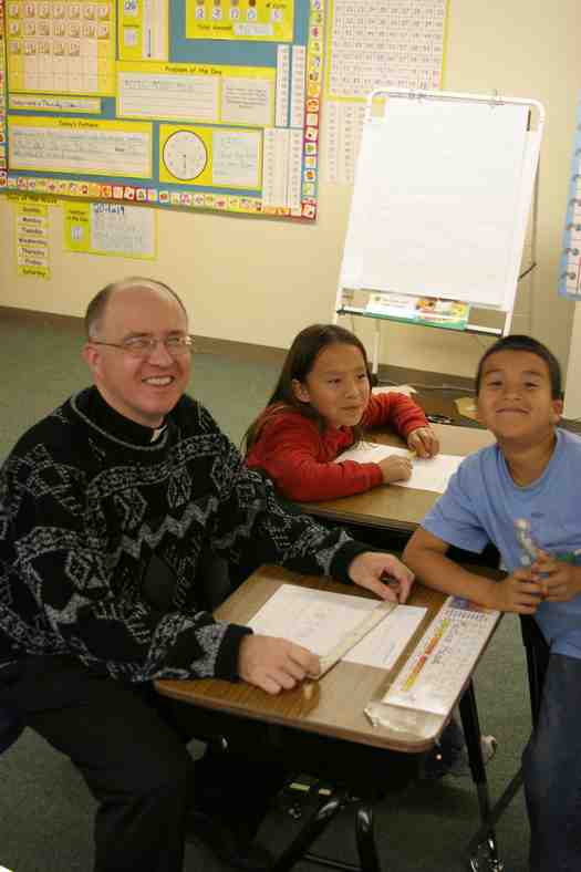 Fr. Steve in the classroom with our Native American students. 