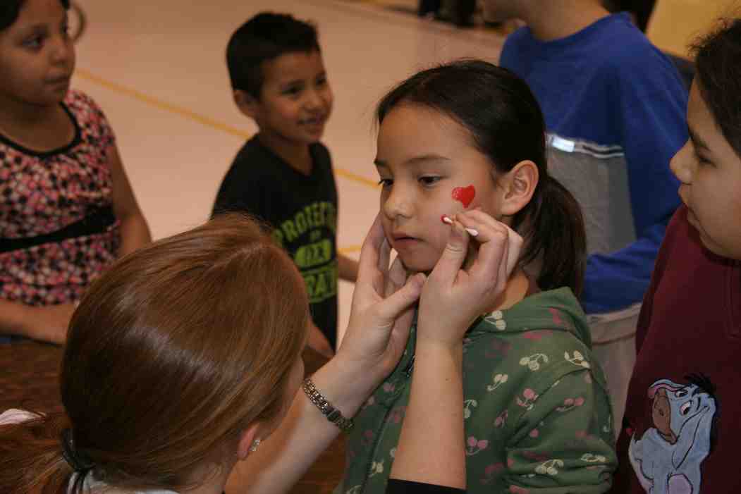 At the carnival, the Native American children got their faces painted!