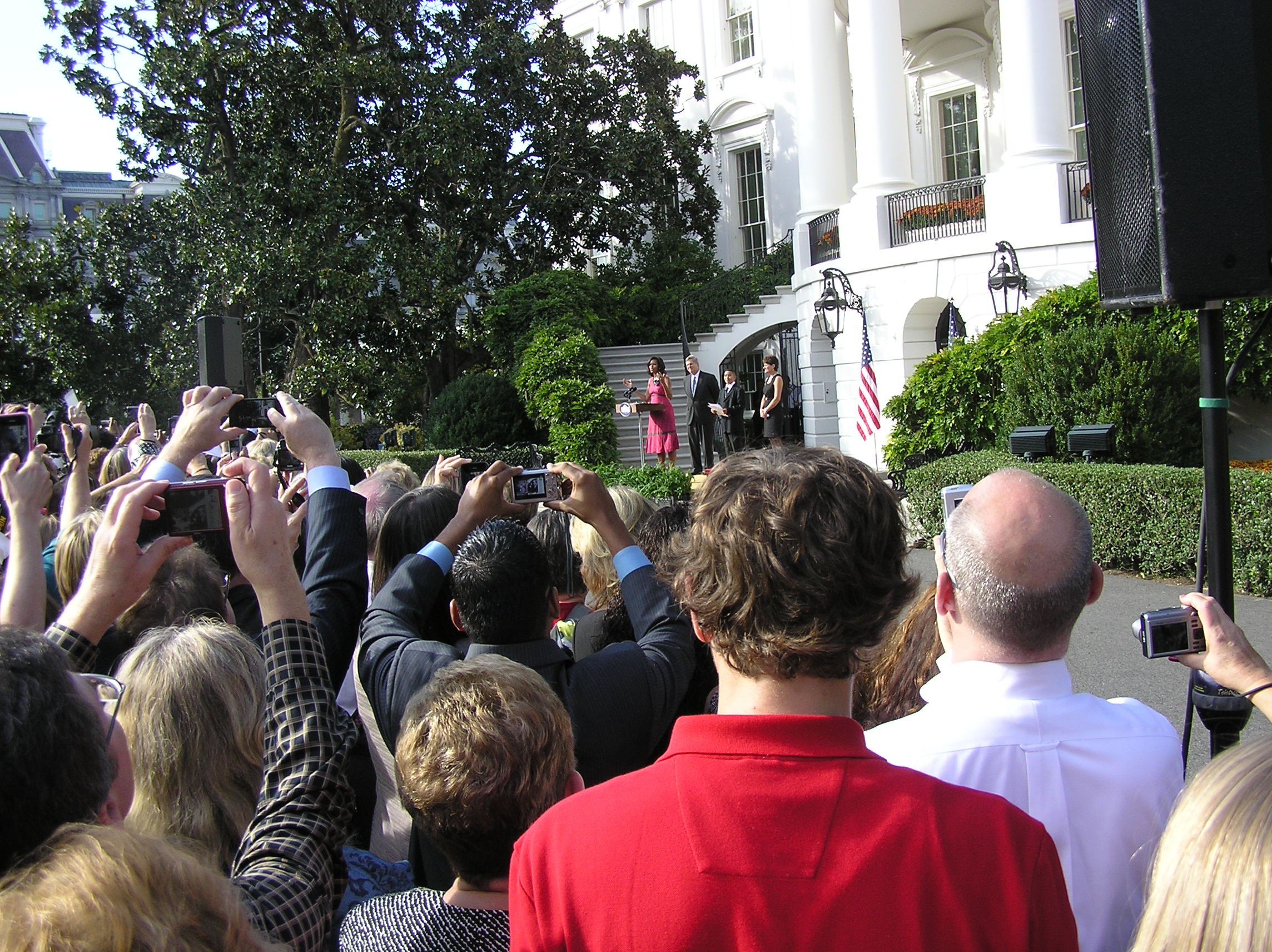 All hands were raised with a camera when First Lady Michelle Obama started her speech.