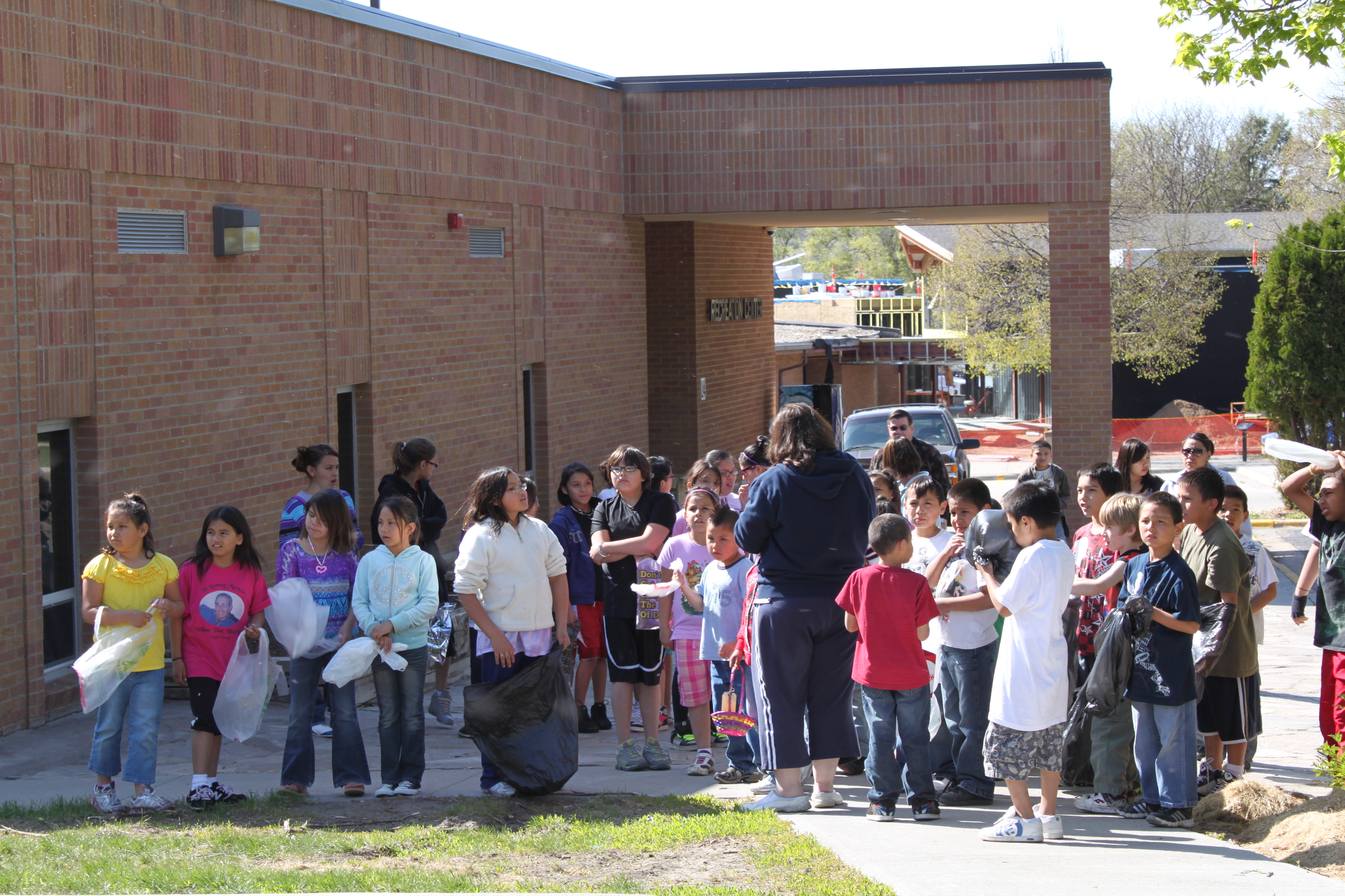 Native American students getting lined up for an Easter Egg Hunt.