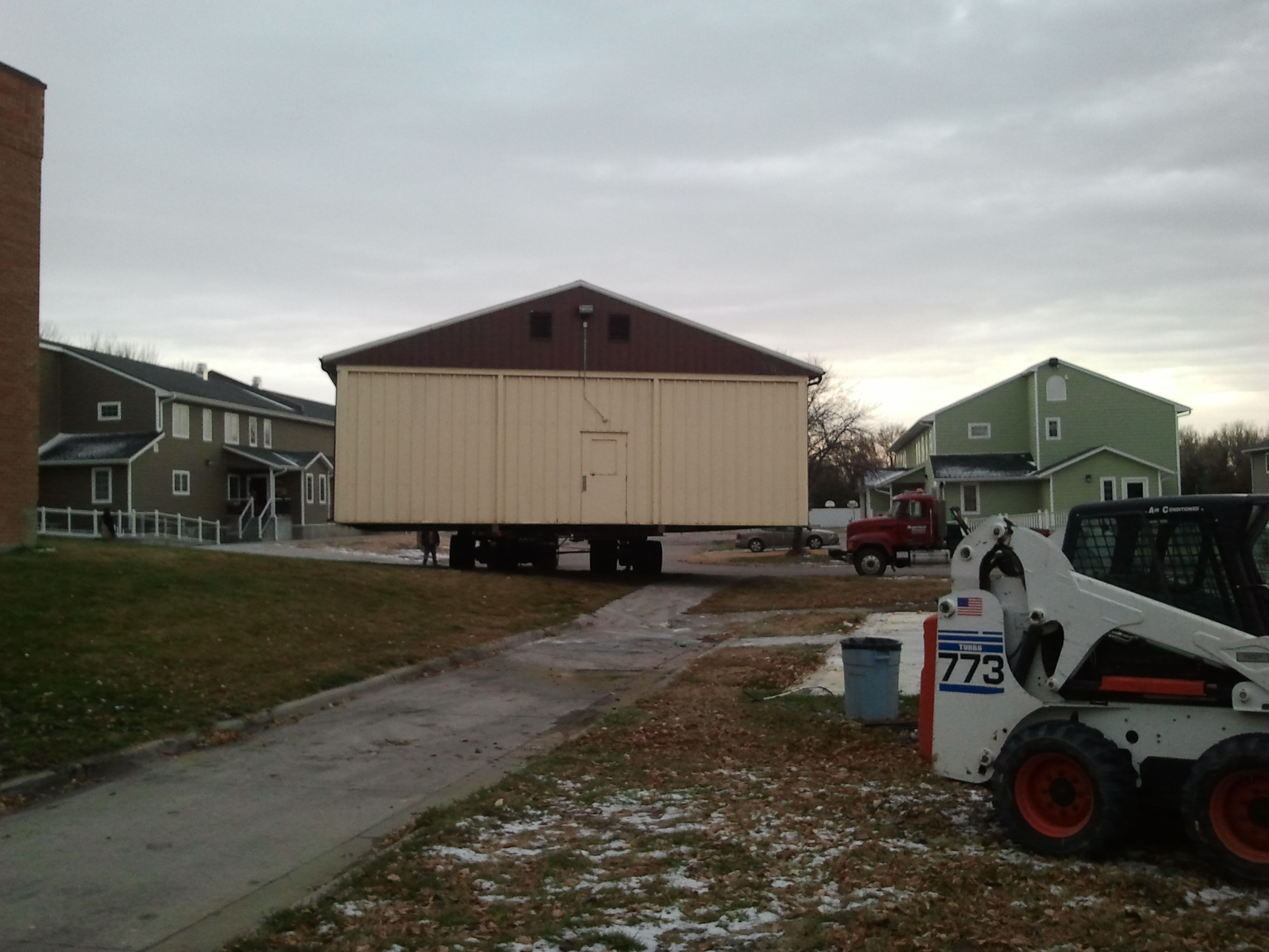 Moving a building from St. Joseph's Indian School. 