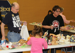 Fr. Steve helped the Lakota students at the prize table during St. Joseph’s Sobriety Carnival. 