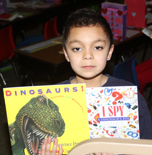 Our youngest Lakota students received new books from a generous donor. 