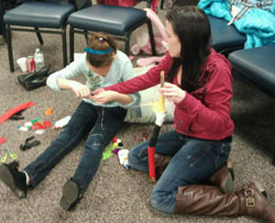Craft projects help make the day enjoyable and relaxing for the Lakota children.