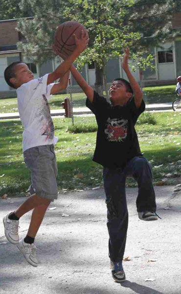 Shooting hoops after school is a favorite pastime of the Lakota boys and girls at St. Joseph’s. 