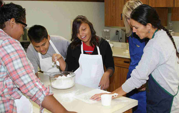 The Lakota students learn to cook in Personal Living Skills class. 