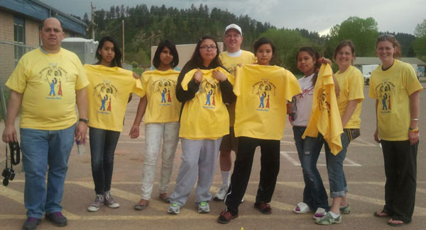 During their cultural trip, the Lakota (Sioux) girls took in a powwow and Fun Walk in Lame Deer, Montana. 