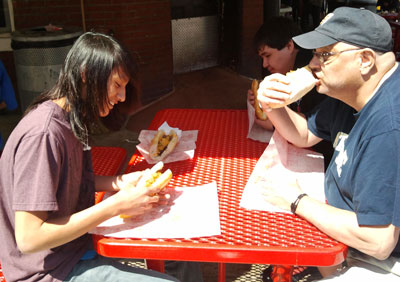 The Native American boys and their teacher enjoy a genuine Philly Cheesesteak. 