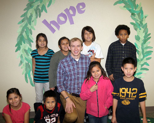 Joe teaches the Native American children Religion at St. Joseph’s Indian School.