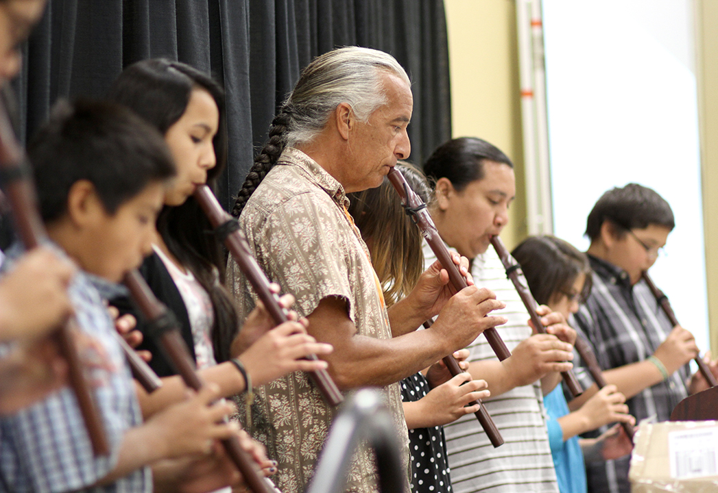 The Lakota children joined Kevin Locke in a flute recital. 