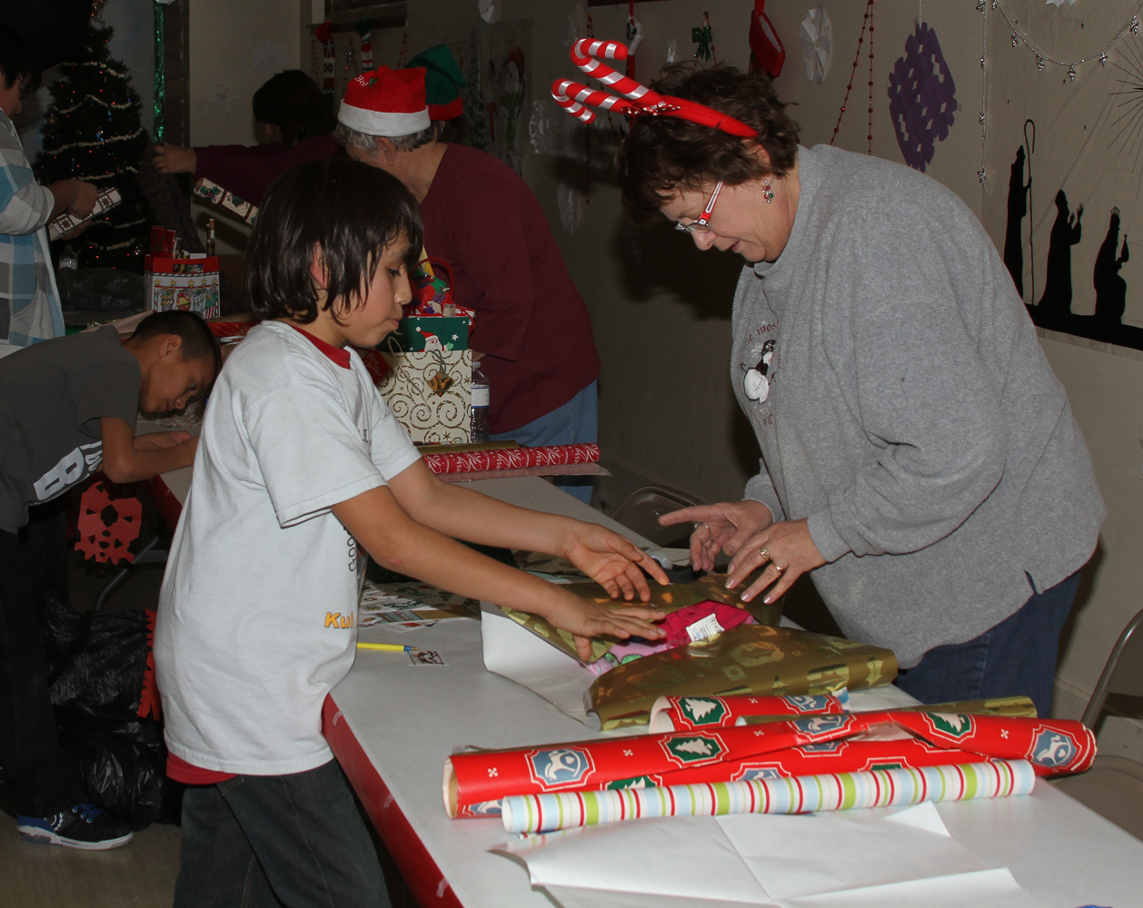 Wrapping presents and Christmas treats finish out the day! 