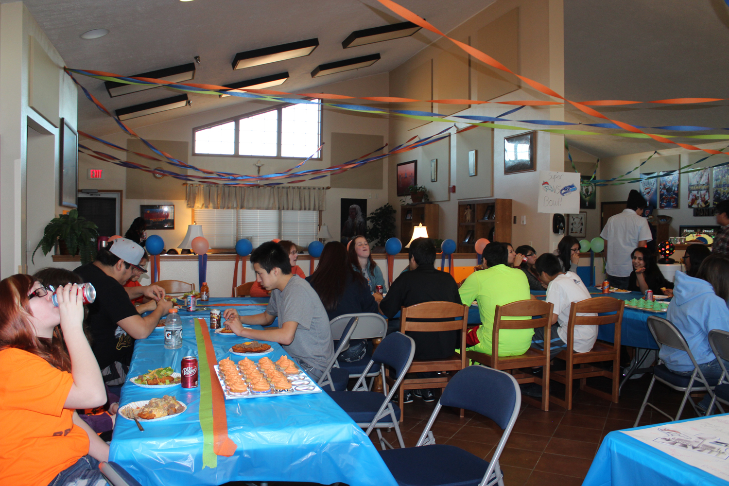 St. Joseph’s Lakota students enjoy a Super Bowl party. 