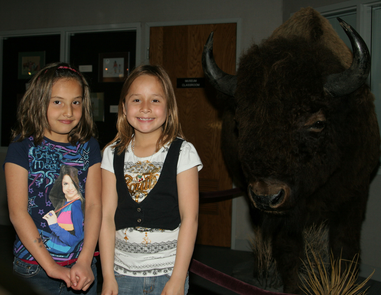 The Lakota children can see a life-sized buffalo in one of the museum’s displays!