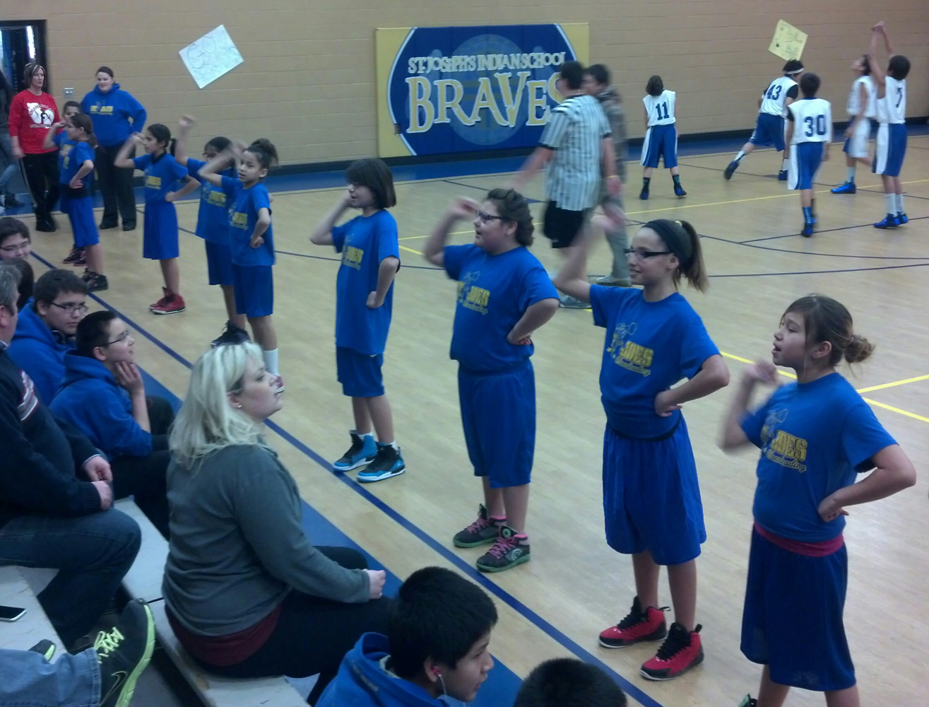 St. Joseph’s students participate in all kinds of sports, including basketball and cheerleading, at our rec center. 