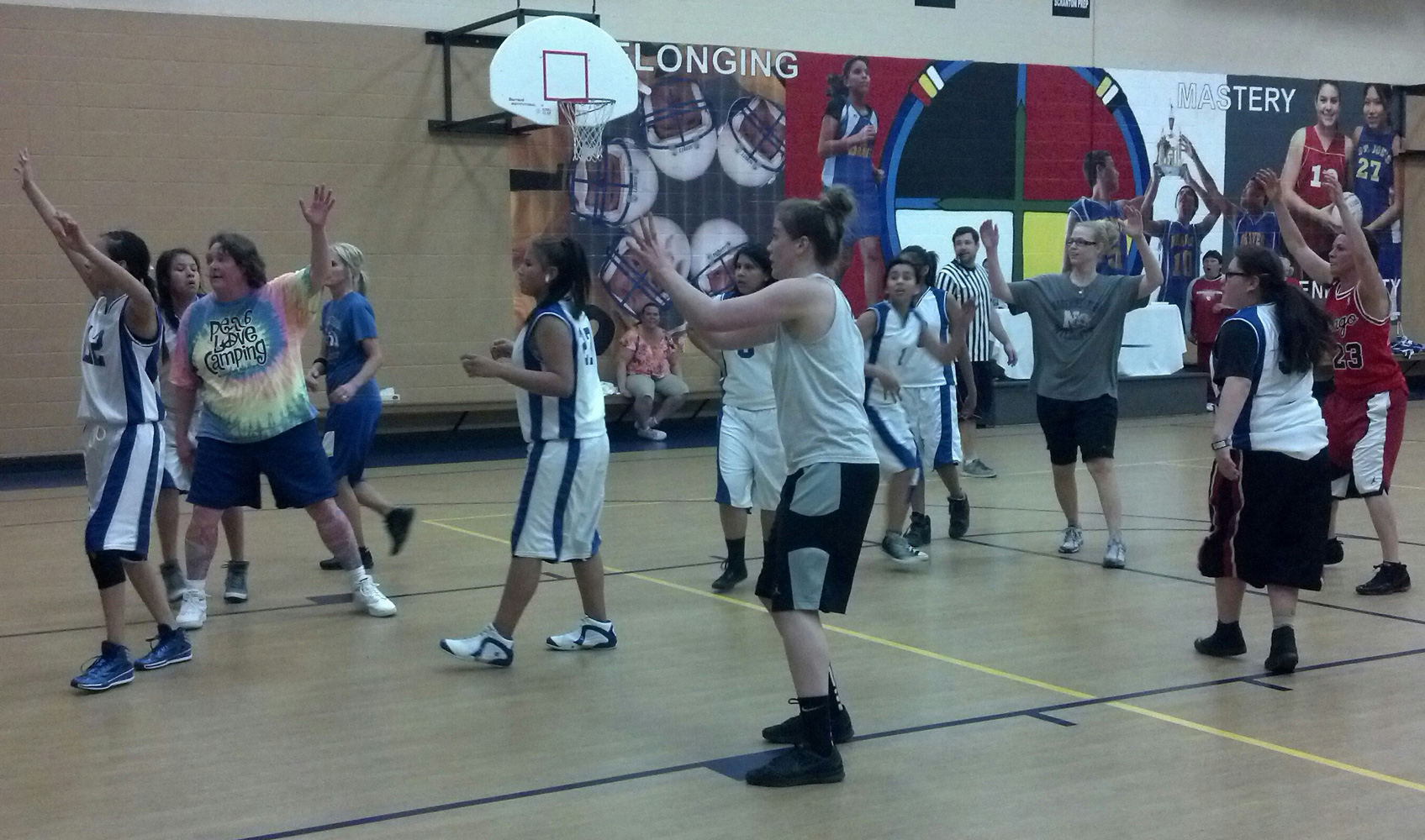 St. Joseph’s eighth grade girls matched up against staff for a basketball game. 