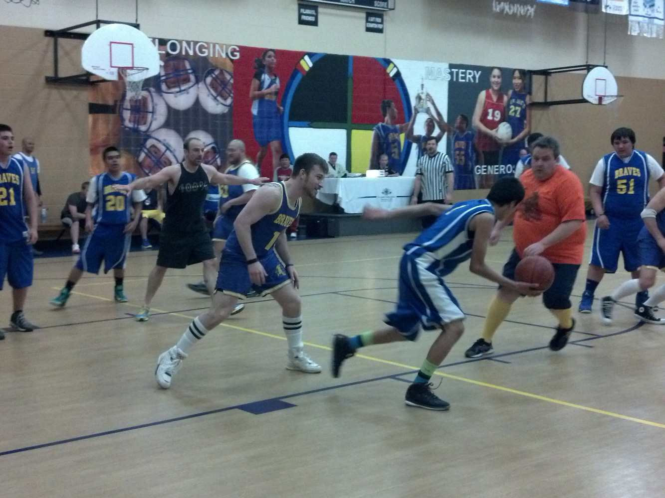 St. Joseph’s eighth grade boys matched up against staff for a basketball game.
