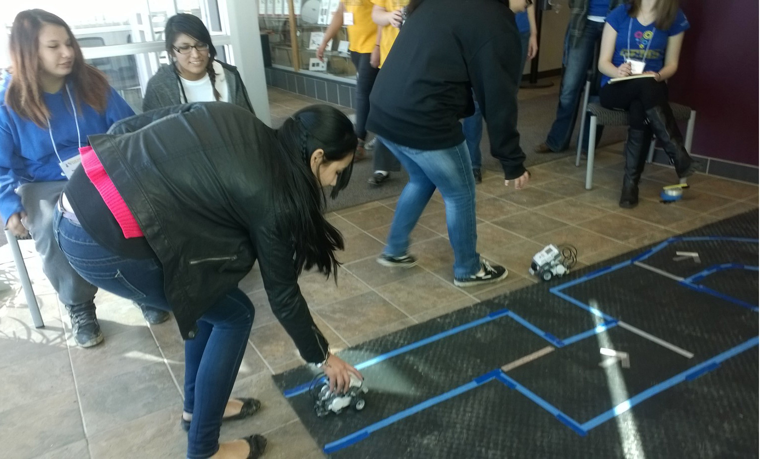 St. Joseph’s eighth grade girls programmed a robot to navigate an obstacle course as part of the GEMS workshop. 