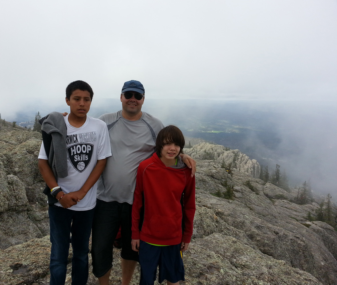 Odis, a houseparent, accompanied students in the summer home on a trip to the Black Hills and Harney Peak. 