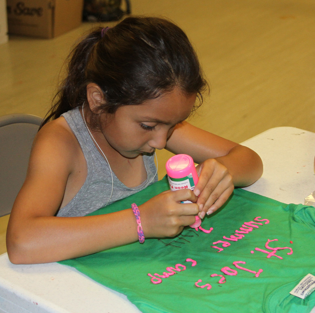 Connor spent time with day camp kids, decorating t-shirts, playing games and swimming. 