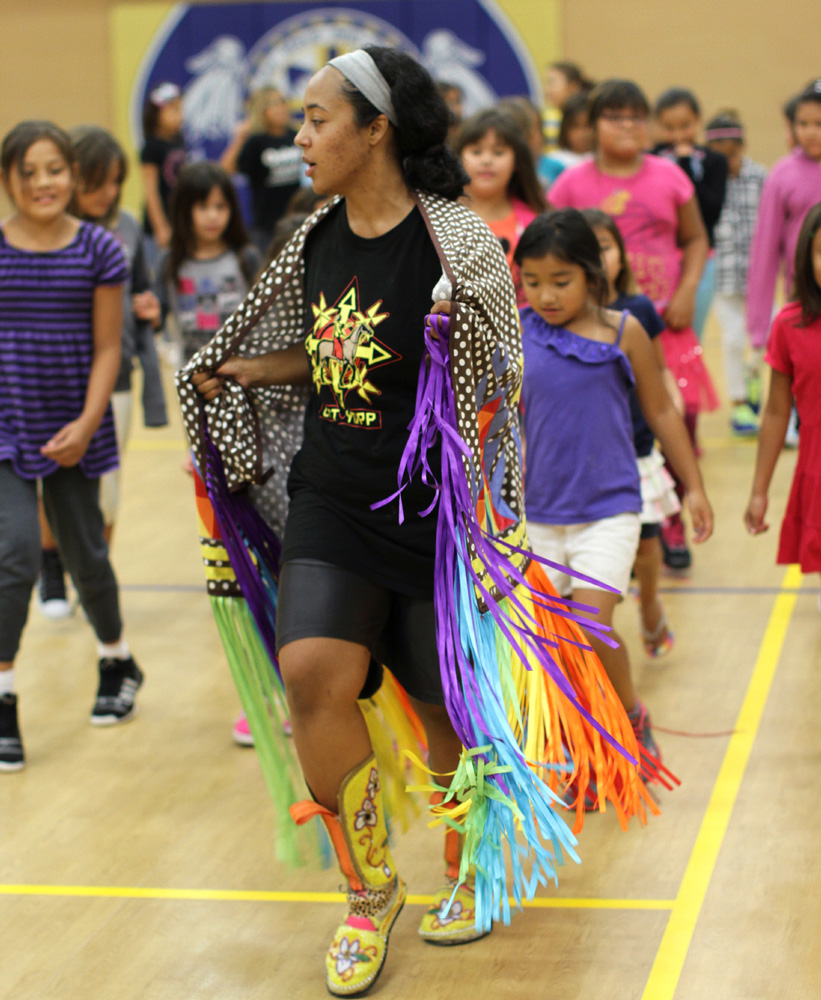 St. Joseph’s has many Native American houseparents like Rachel, who teaches students about powwow dances. 