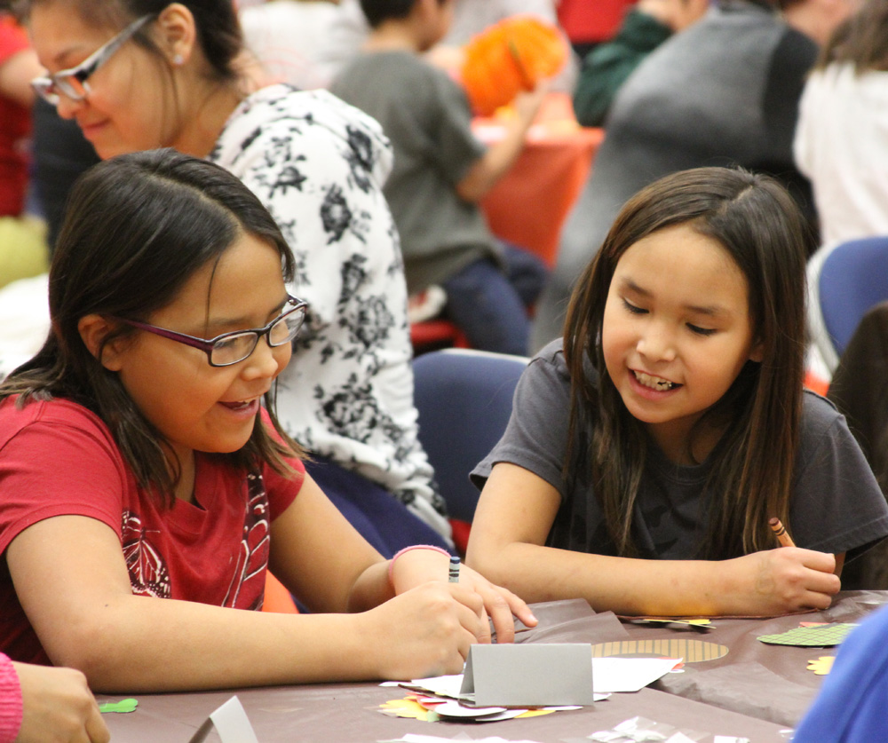 Each year, students take home a table decoration and food boxes to help their family celebrate the holiday. 