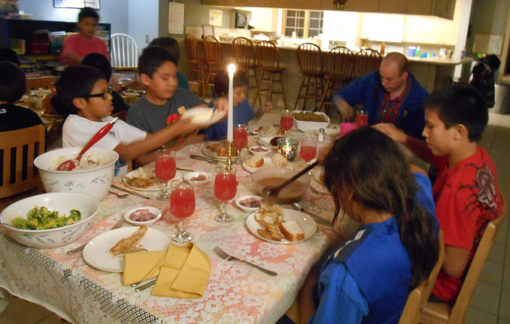 A “fancy” dinner including toasts and candle light helped the boys learn good manners. 