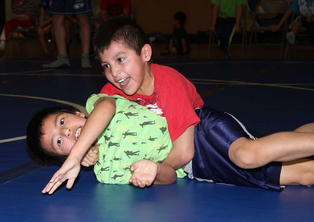 St. Joseph’s younger boys are learning to wrestle. 