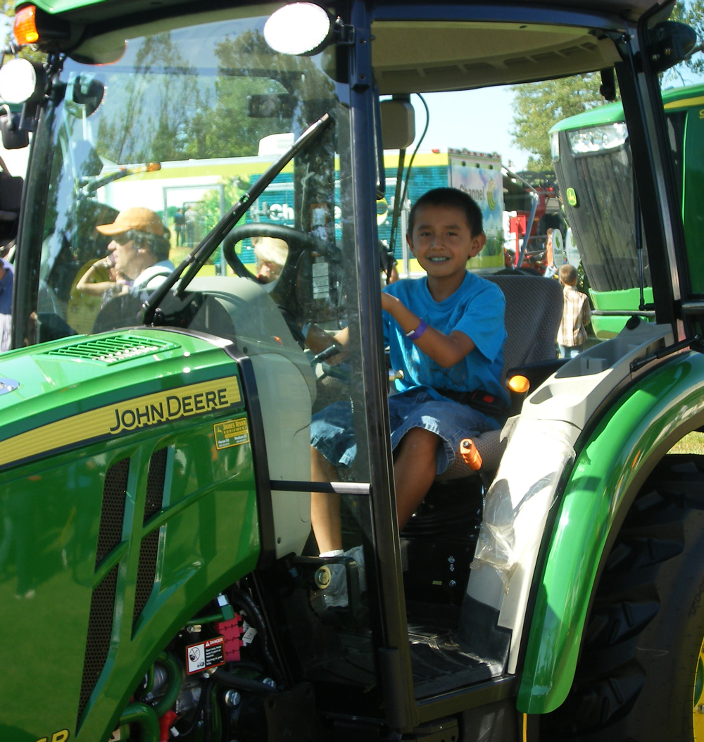 The Lakota boys loved the farm equipment! 
