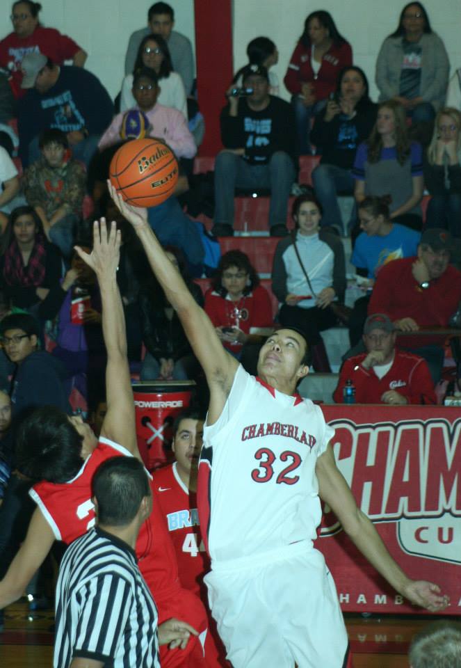 Adrian, a St. Joseph’s junior, works hard on the Chamberlain high school basketball team. 