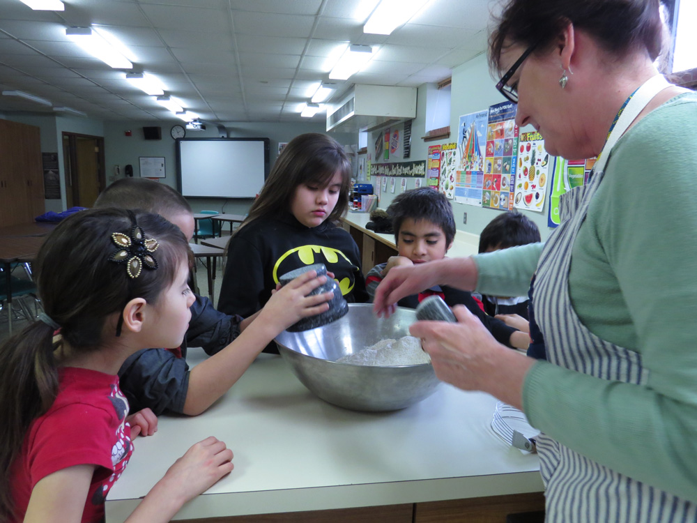 The children made bread which they shared with their homes. 