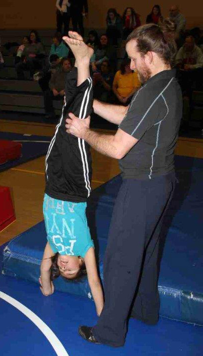 St. Joseph’s gymnastics girls don’t participate in competitions yet, but focus on learning the basics. 