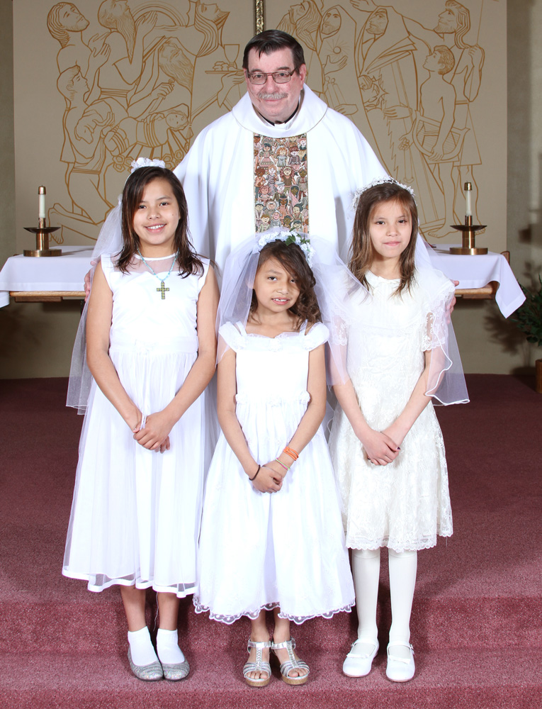 Fr. Anthony and the Lakota children. 