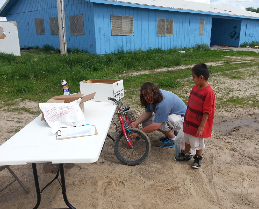 You need all kinds of skills on the bookmobile, including bike mechanics! 