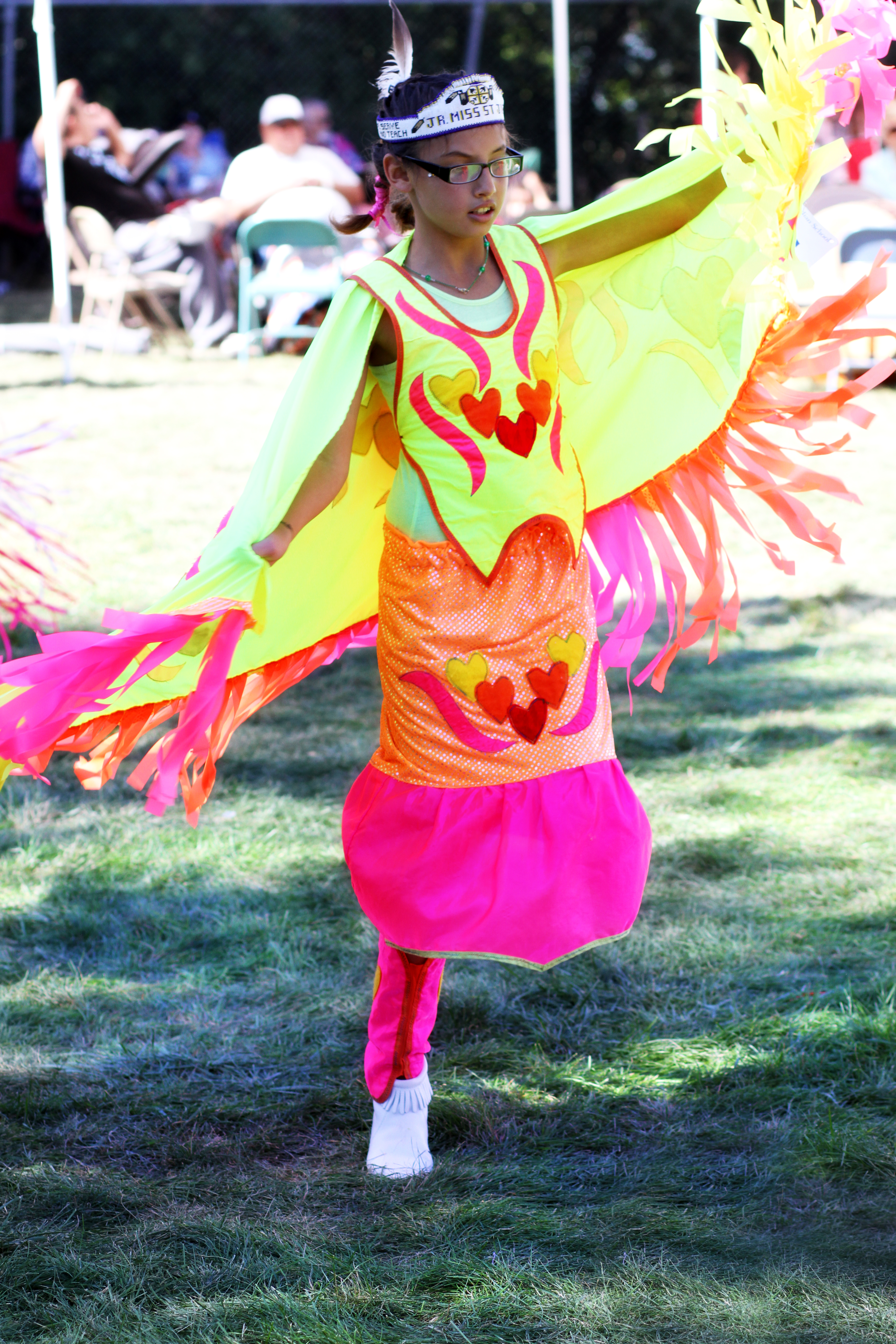 A Lakota (Sioux) girl dances fancy shawl at last year's powwow. 