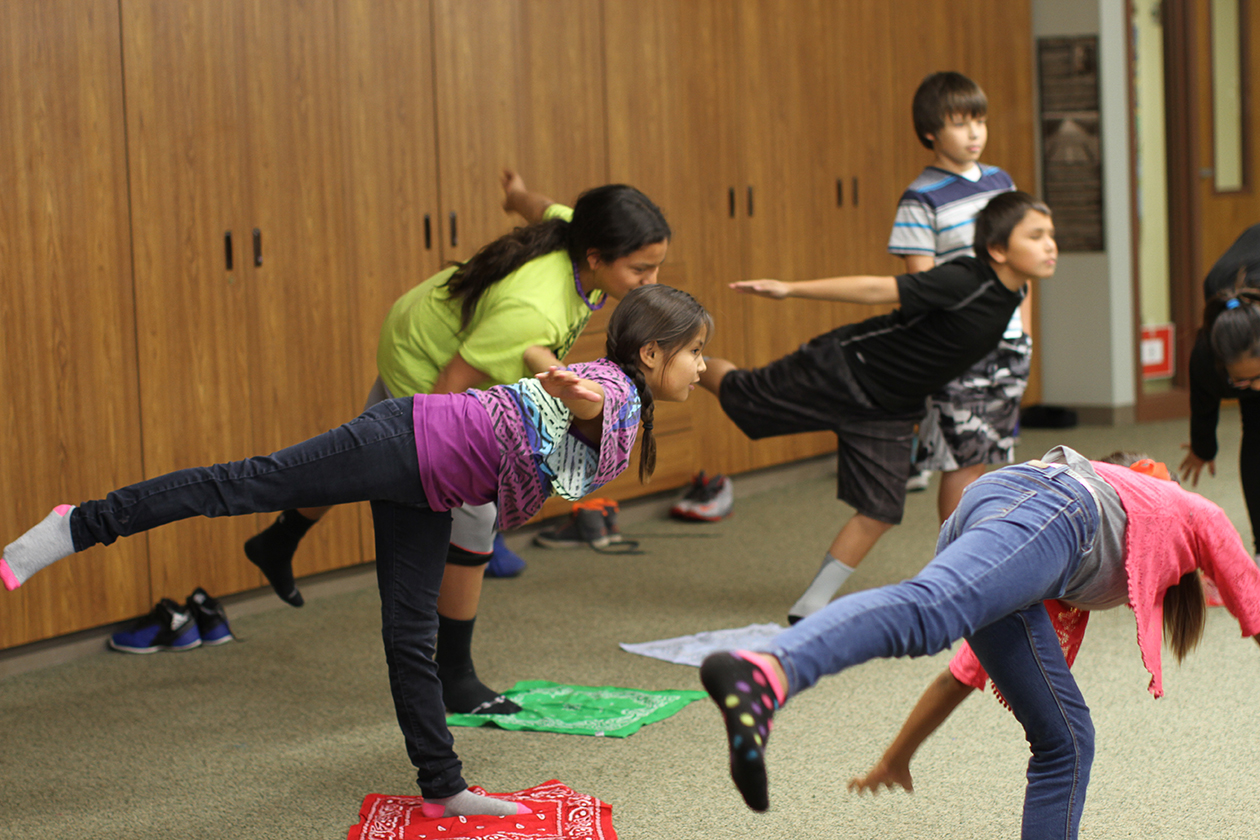 Lakota (Sioux) students learning ballet moves. 