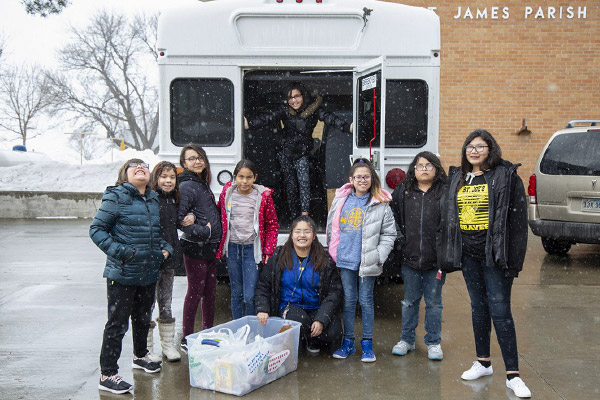 Some fourth through sixth grade students took a donation of food to a local food pantry.