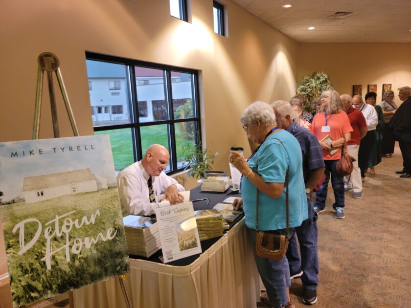 St. Joseph's Indian School donors attending powwow in September had the wonderful opportunity to have their books signed by Mike Tyrell, the author of Detour Home. 