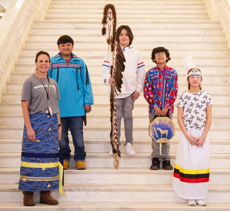 LaRayne, Jay, Romeo, Caden and Aleighya, all of St. Joseph's Indian School, pose for a photo on the Capitol Building stairs. 