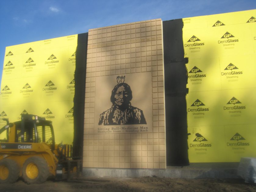 March 2012 – precast artwork is installed on the exterior of the Historical Center building.